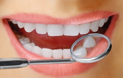 拔牙第三天牙龈疼正常吗