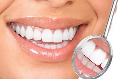 冰瓷美牙贴面有副作用吗_冰瓷牙贴面的制作流程